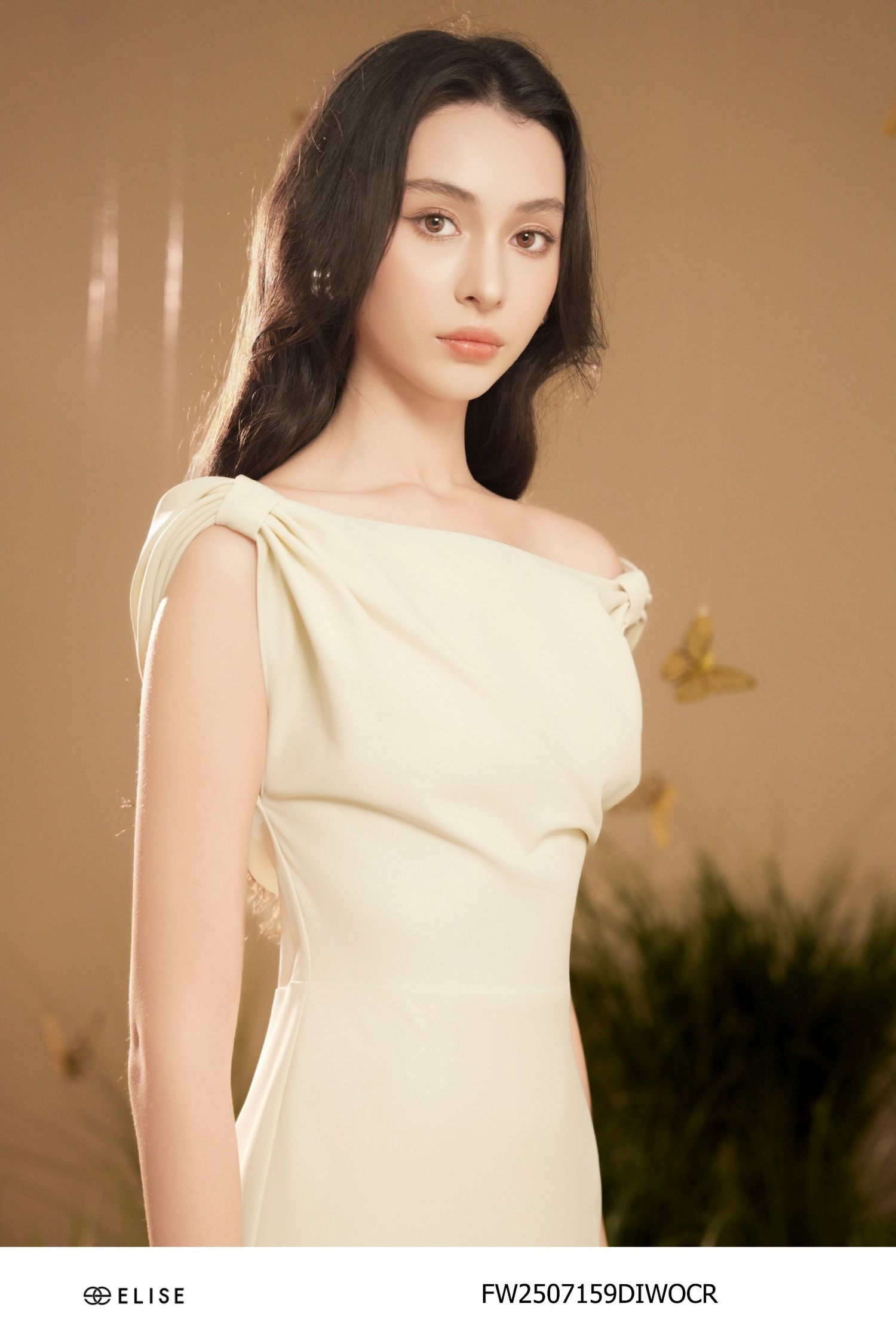 ĐẦM TUYTSY KEM TRỄ VAI