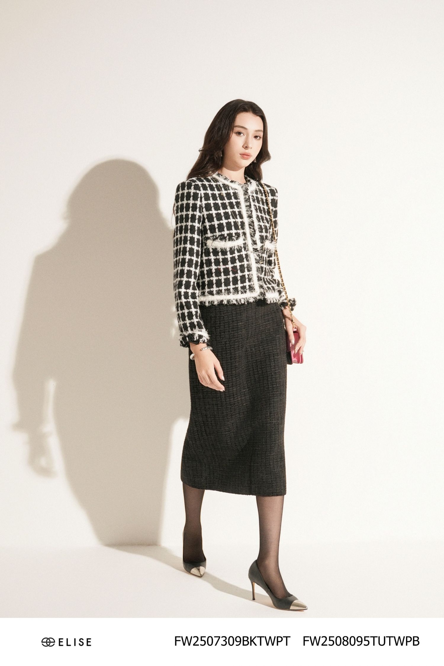 JUPE DẠ TWEED SỢI KẺ Ô ĐEN XẺ SAU