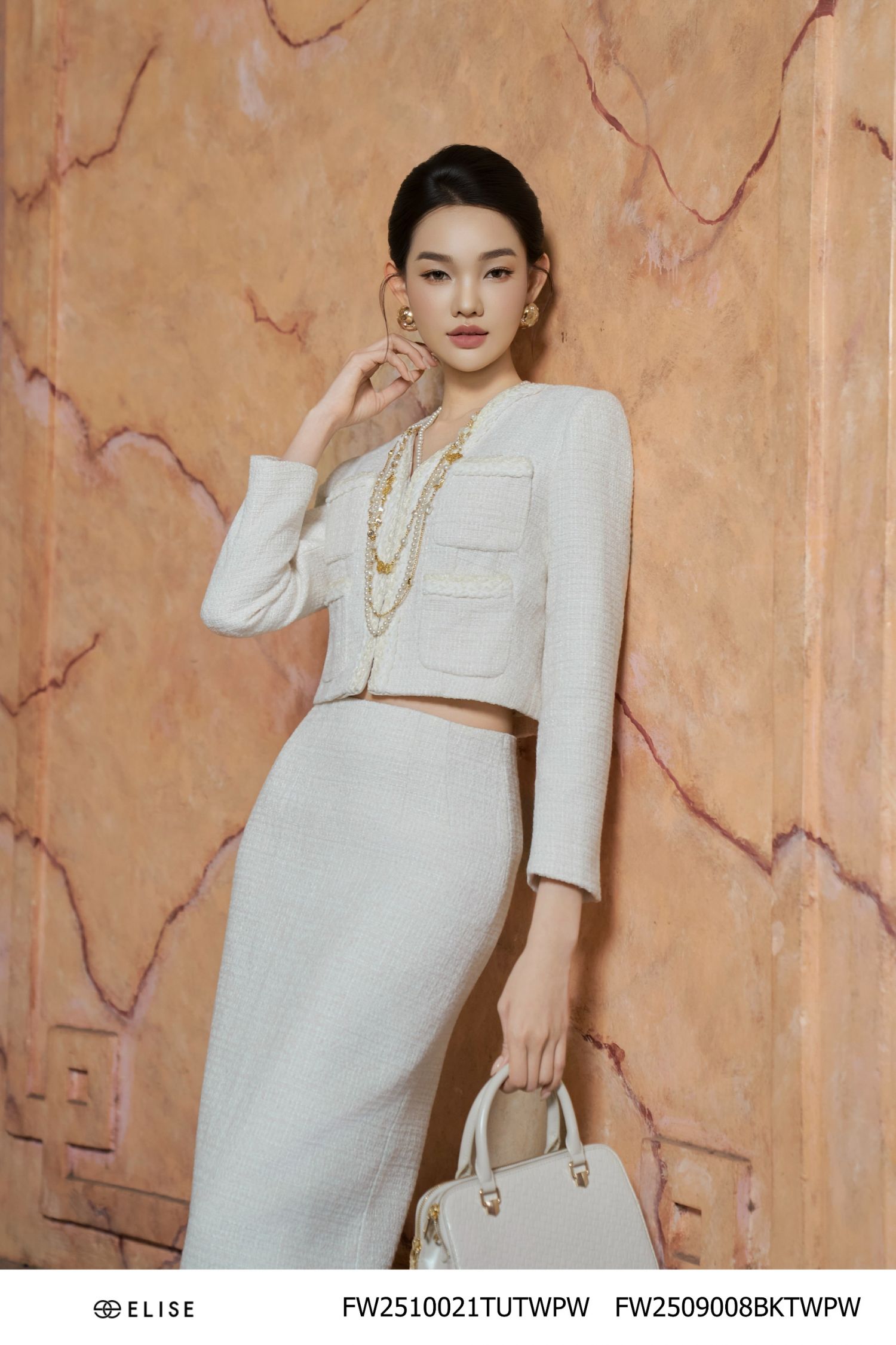JUPE TWEED VÂN Ô TRẮNG XẺ SAU