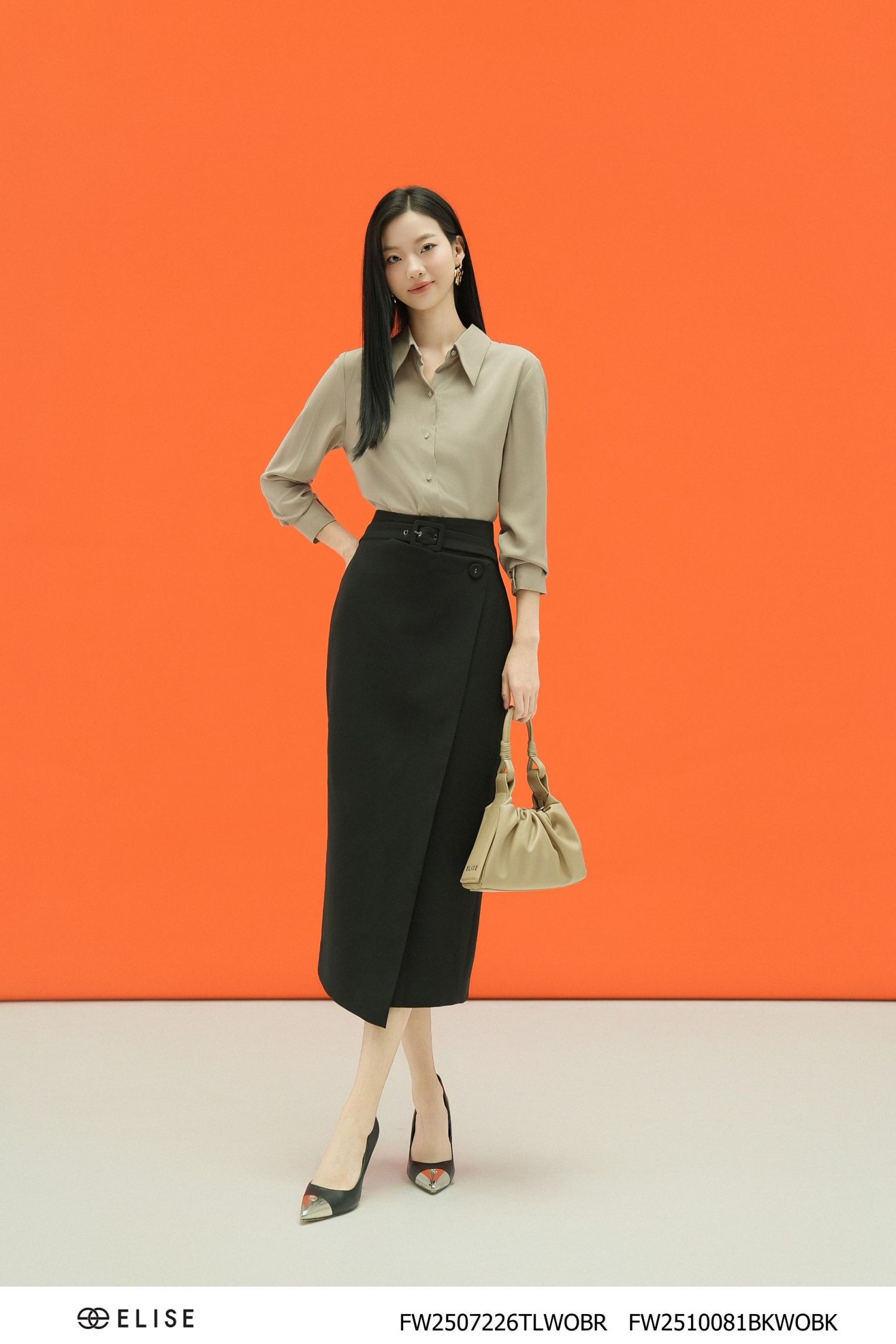JUPE BÚT CHÌ ĐEN PHỦ VẠT CHÉO ĐAI CẠP